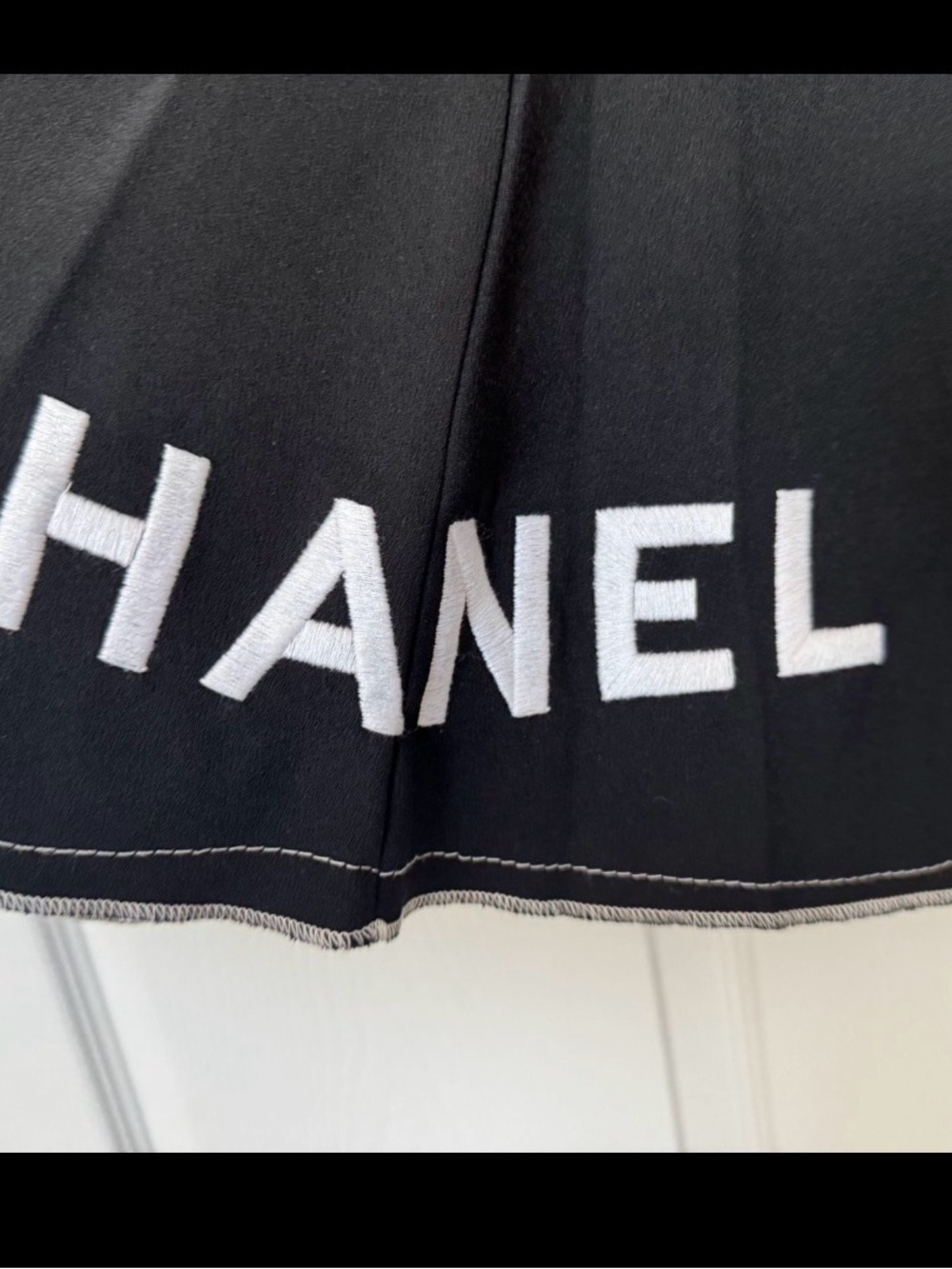 CHANEL Black A-Line Skirt with White Logo Accents - Picture 2 of 4